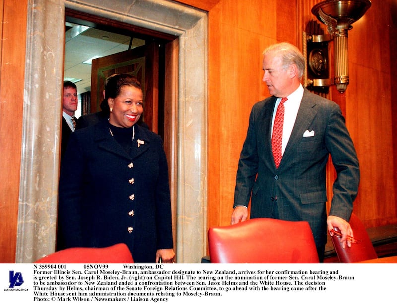 N 359904 001 05NOV99 Washington, DC Former Illinois Sen. Carol Moseley-Braun, ambassador designate to New Zealand, arrives for her confirmation hearing and is greeted by Sen. Joseph R. Biden, Jr. (right) on Capitol Hill. The hearing on the nomination of former Sen. Carol Moseley-Braun to be ambassador to New Zealand ended a confrontation between Sen. Jesse Helms and the White House. The decision Thursday by Helms, chairman of the Senate Foreign Relations Committee, to go ahead with the hearing came after the White House sent him administration documents relating to Moseley-Braun. Photo: Mark Wilson / Newsmakers / Liaison Agency
