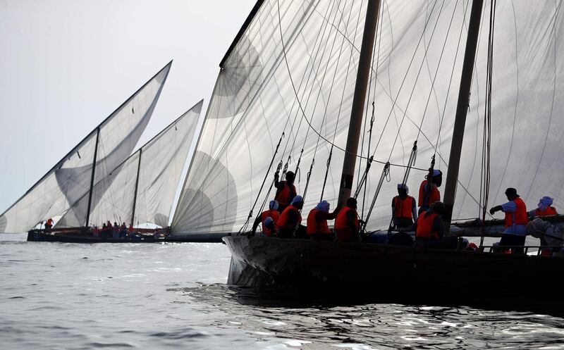 Sailors participate in the annual long-distance dhow sailing race, known as Al Gaffal, near Sir Abu Nair island towards Dubai.  AFP