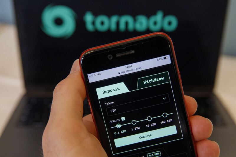 The Tornado Cash website displayed on a laptop and smartphone screen. The platform allows cryptocurrency traders to obfuscate their transaction activity. Bloomberg