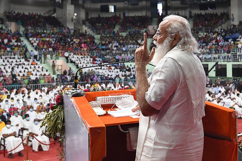 In this handout photograph taken on February 14, 2021 and released by the Indian Press Information Bureau (PIB), India's Prime Minister Narendra Modi gestures as he addresses a gathering in Chennai.  - RESTRICTED TO EDITORIAL USE - MANDATORY CREDIT "AFP PHOTO /PIB " - NO MARKETING - NO ADVERTISING CAMPAIGNS - DISTRIBUTED AS A SERVICE TO CLIENTS
 / AFP / PIB / - / RESTRICTED TO EDITORIAL USE - MANDATORY CREDIT "AFP PHOTO /PIB " - NO MARKETING - NO ADVERTISING CAMPAIGNS - DISTRIBUTED AS A SERVICE TO CLIENTS
