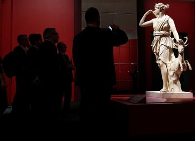 Visitors look at the marble statue of Diana of Versailles at the Louvre Abu Dhabi in Abu Dhabi, UAE, December 19, 2017. REUTERS/Satish Kumar