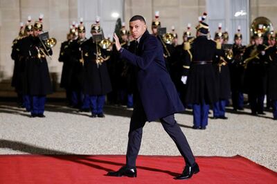 Paris Saint-Germain forward Kylian Mbappe arrives at the Elysee Palace in Paris on Tuesday. AFP