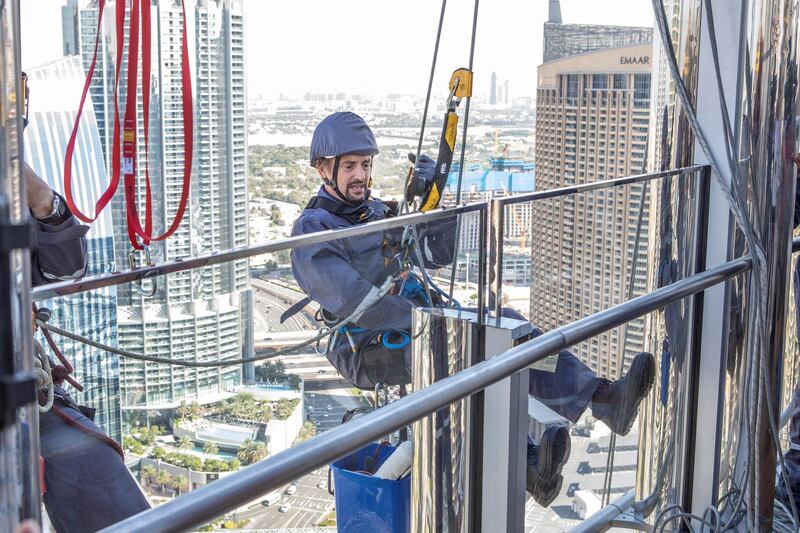 Richard Hammond prepares to window clean the exterior of Burj Khalifa, Dubai.