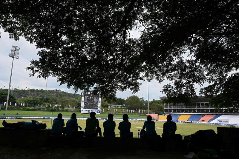 Ground staff at the Pallekele International Cricket Stadium watch the action during day 3 of the second Test match between Sri Lanka and Bangladesh in Kandy, on Saturday, May 1. AFP