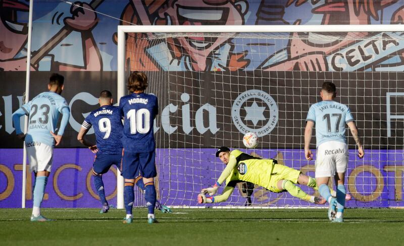 Celta Vigo goalkeeper Matias Dituro saves a penalty from Karim Benzema. Reuters