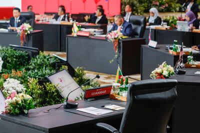 A seat for Myanmar's delegate is left empty during the opening session of the 32nd Asean Co-ordinating Council Meeting in Jakarta this month. EPA