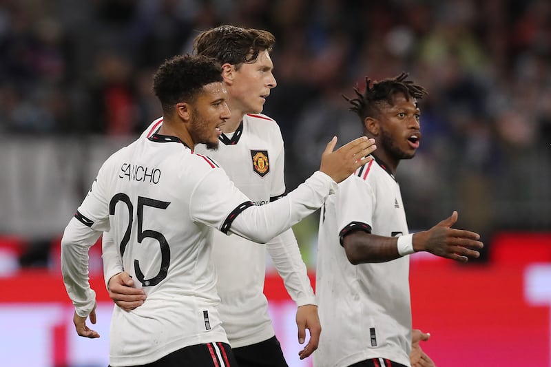 Jadon Sancho of Manchester United celebrates with team mates after scoring during the friendly against Aston Villa at the Optus Stadium in Perth on Saturday. July 23, 2022. Getty