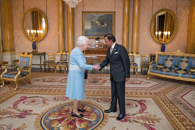 Queen Elizabeth meets the Sultan of Brunei during a private audience at Buckingham Palace in December 2017. Getty Images