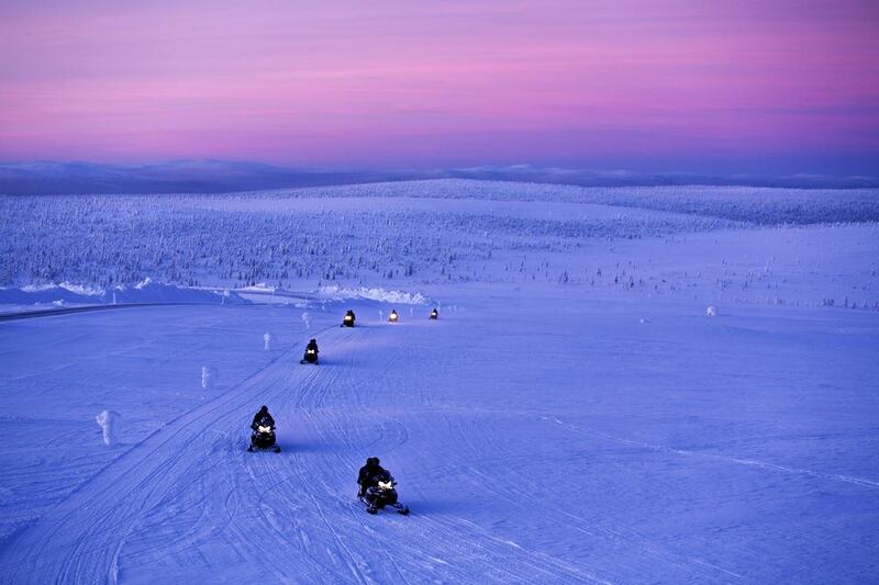 Snowmobile safari at Kakslauttanen Arctic Resort. Valtteri Hirvonen / Kakslauttanen Arctic Resort