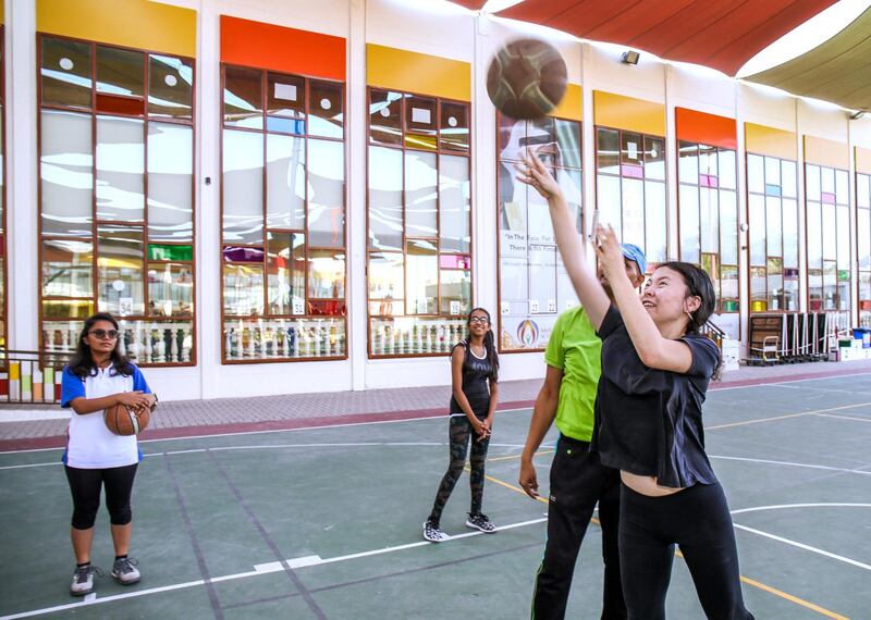 December 10, 2017.   Studentsf rom Ambassador school with students with disabilities from Tender Hearts school. (black)  Jifu a student from Tender Hearts shoots the ball.
Victor Besa for The National
National
Reporter:  Ramola Talwar