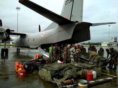 epa07766328 A handout photo made available by Indian Defense Ministry shows Indian military personnel conducting rescue operations in the flood affected areas in Belgaum/Belagavi district in North Karnataka, India, 10 August 2019. Over 80 have been killed in Kerala and Karnataka in flood-related incidents. Heavy rainfall has affected various parts of Kerala and northern Karnataka, and Kerala State Disaster Management Authority (KDSMA) evacuated 235000 people and moved them to 315 camps across the state in view of the heavy rains.  EPA/INDIA INDIAN DEFENSE MINISTRY PRO HANDOUT  HANDOUT EDITORIAL USE ONLY/NO SALES