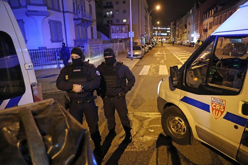 French police forces secure an area during an operation in the Neudorf district in Strasbourg, where the police shooting took place. EPA