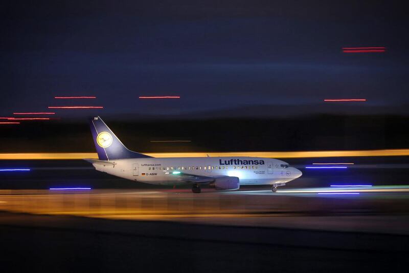 A Lufthansa aircraft lands at the airport in Frankfurt. Fredrik Von Erichsen / EPA