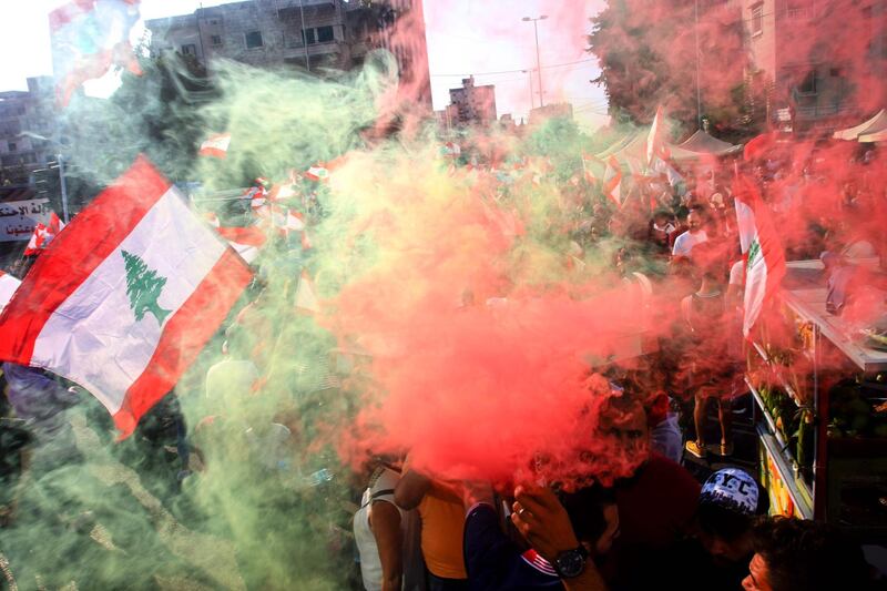 Demonstrators attend a protest in the Lebanese southern port city of Sidon. AFP