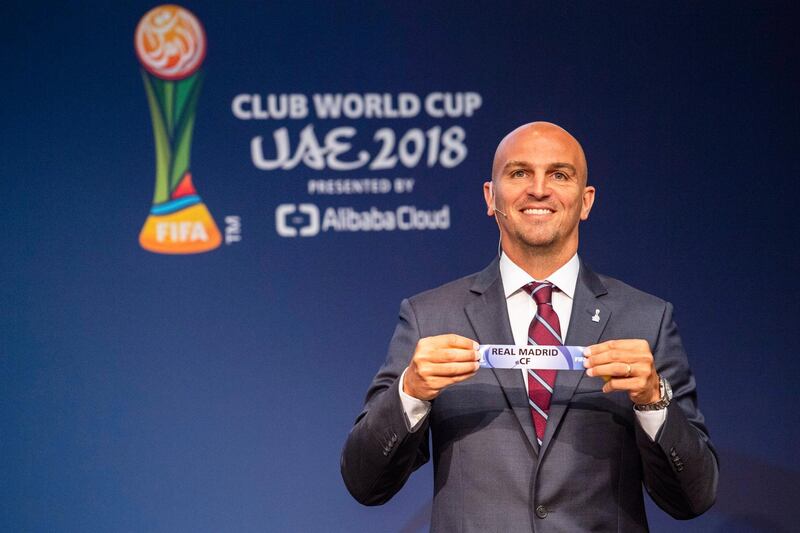 epa06995666 Former Argentine soccer player Esteban Cambiasso shows the ticket of Real Madrid during the draw of the FIFA Club World Cup UAE 2018 at the FIFA headquarters in Zurich, Switzerland, 04 September 2018.  EPA/ENNIO LEANZA
