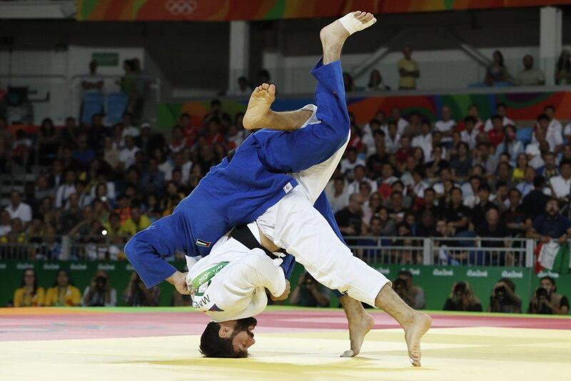 UAE’s Sergiu Toma in action against Italy’s Matteo Marconcini during their men’s 81kg judo bronze medal A match of the Rio 2016 Olympic Games in Rio de Janeiro on August 9, 2016. Jack Guez / AFP