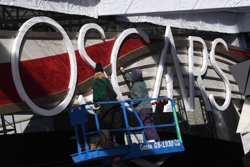 People work on the red carpet area as preparations for the 91st Academy Awards take place in Hollywood, California, USA. AFP