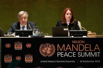 U.N. Secretary General Antonio Guterres, left, joined by U.N. General Assembly President Maria Fernanda Espinosa, addresses the Nelson Mandela Peace Summit in the United Nations General Assembly, at U.N. headquarters, Monday, Sept. 24, 2018. (AP Photo/Richard Drew)