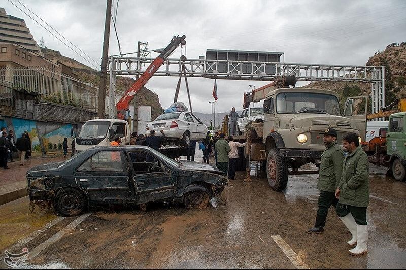Damaged vehicles are seen after a flash flooding In Shiraz. Reuters