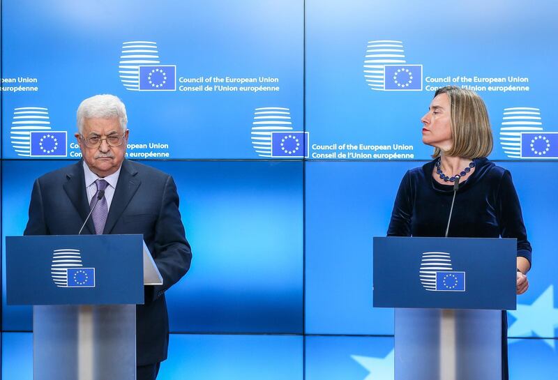 epa06464845 The Palestinian President Mahmoud Abbas (L) and EU High Representative for Foreign Affairs Federica Mogherini (R) give a joint statement prior to a meeting at the EU Council in Brussels, Belgium, 22 January 2017.  EPA/STEPHANIE LECOCQ