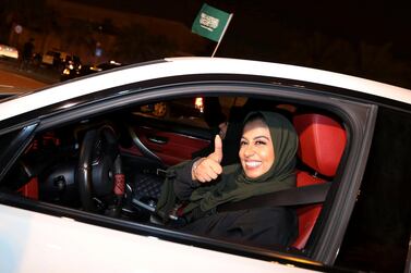 A Saudi woman celebrates as she drives her car in her neighbourhood, in Al Khobar, Saudi Arabia, on June 24, 2018. Hamad I Mohammed / Reuters