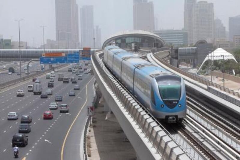 Dubai - June 12, 2011 - The southbound Red Line metro leaves the Nakheel Station in Dubai, June 12, 2011. (Photo by Jeff Topping/The National) 

 