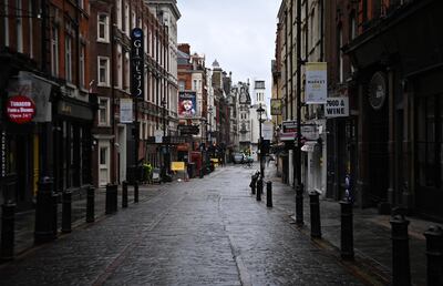 epa09016477 Deserted streets around Soho in London, Britain, 16 February 2021. The UK government is preparing to announce the lifting of third UK lockdown. British Prime Minister Boris Johnson is set to deliver a speech 22 February to outline the easing of lockdown restrictions.  EPA/ANDY RAIN