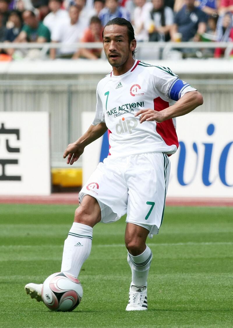 YOKOHAMA, JAPAN - JUNE 07:  Hidetoshi Nakata of the Japan Stars Team passes the ball during the +1 football match between Japan Stars and World Stars at Nissan Stadium on June 7, 2008 in Yokohama, Kanagawa, Japan.  (Photo by Junko Kimura/Getty Images)