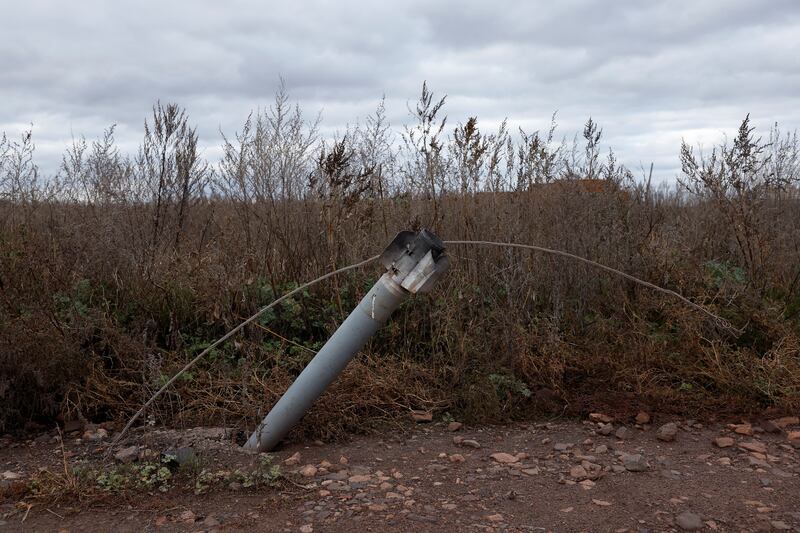 A missile stuck in the ground after destroying an electricity line amid Russia's attack on Ukraine, in the Kharkiv region.  Reuters.