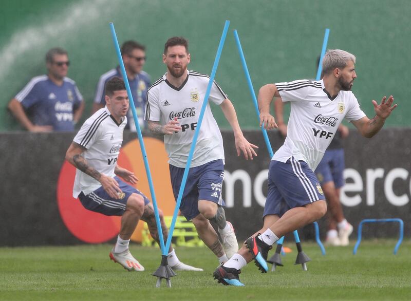 Messi and teammates during training. Reuters
