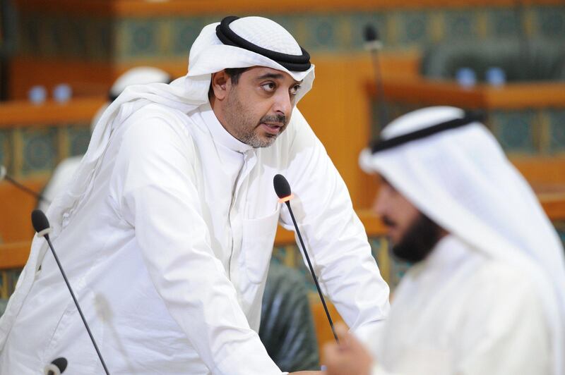Sheikh Mohammed Abdullah Al Mubarak, the minister of state for cabinet affairs and acting information minister, responds to questions from opposition MPs during the first session of the National Assembly on October 24, 2017. KUNA
