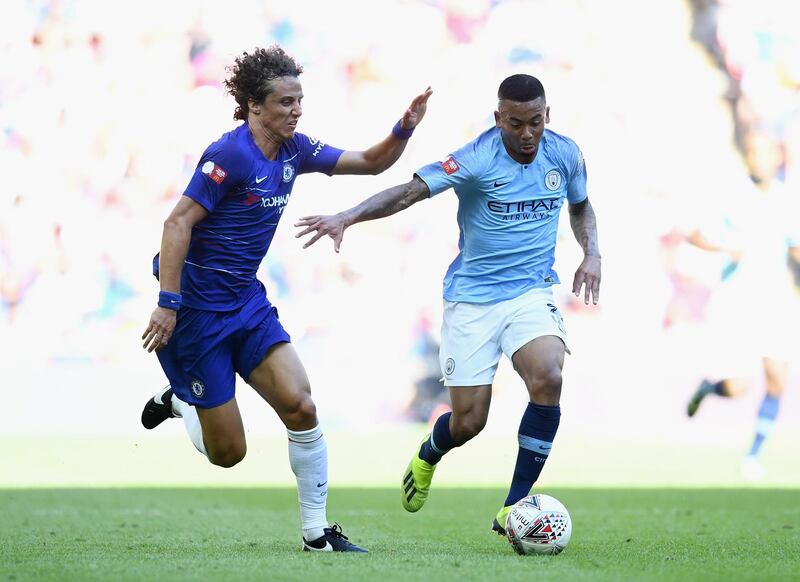 LONDON, ENGLAND - AUGUST 05:  Gabriel Jesus of Manchester City holds off David Luiz of Chelsea  during the FA Community Shield between Manchester City and Chelsea at Wembley Stadium on August 5, 2018 in London, England.  (Photo by Clive Mason/Getty Images)