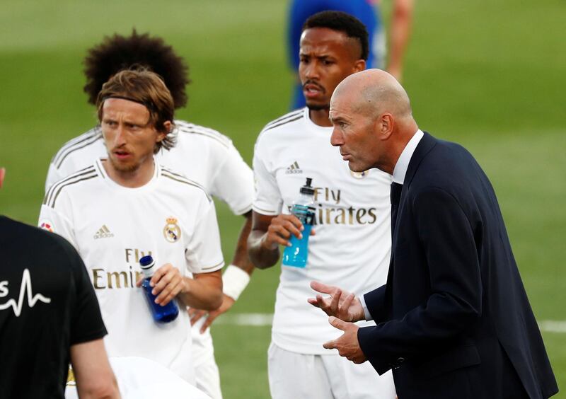 Luka Modric with coach Zinedine Zidane during drinks break. Reuters