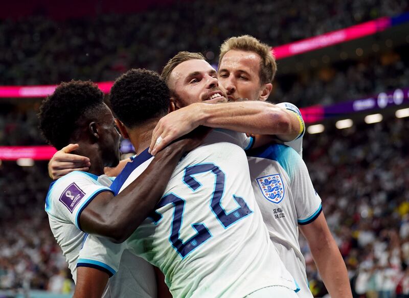 England's Jordan Henderson celebrates scoring the opening goal with Jude Bellingham, Harry Kane and Bukayo Saka. PA