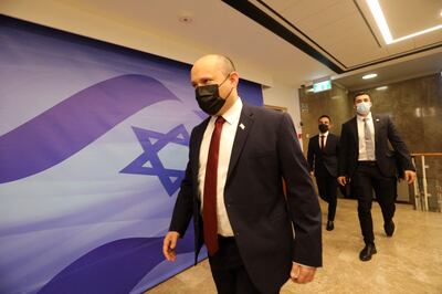 Israeli Prime Minister Naftali Bennett arrives at his office to head a weekly Cabinet meeting in Jerusalem. AFP