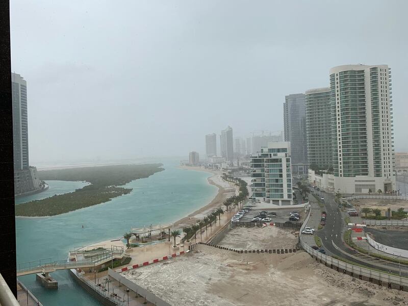 Rain is seen over Reem Island. Stephen Nelmes / The National