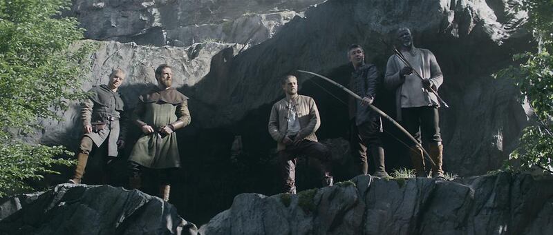 From left, Freddie Fox as Ed, Craig McGinlay as Harry, Charlie Hunnam as Arthur, Aidan Gillen as Bill, and Djimon Hounsou as Bedivere in King Arthur: Legend of the Sword. Courtesy Warner Bros Entertainment Inc 