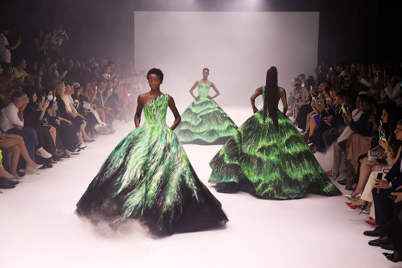 Michael Cinco ended his show with three gowns inspired by the Northern Lights.