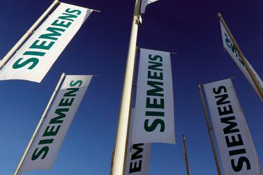 Siemens on Thursday signed a 10-year lease agreement to set up its Dubai operations at District 2020. AP