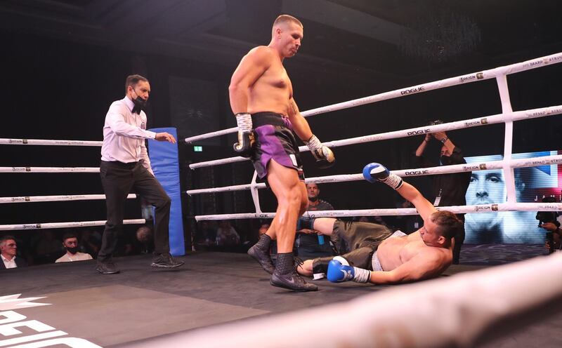 Jamie King floors Medhat El Housny during their fight on the Hafthor Bjornsson-Simon Vallily undercard. EPA