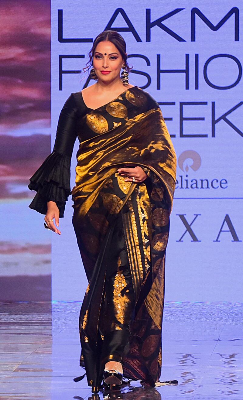 Bollywood actress Bipasha Basu presents a creation by Sanjuktta Dutta during Lakme Fashion Week in Mumbai on February 14, 2020. AFP