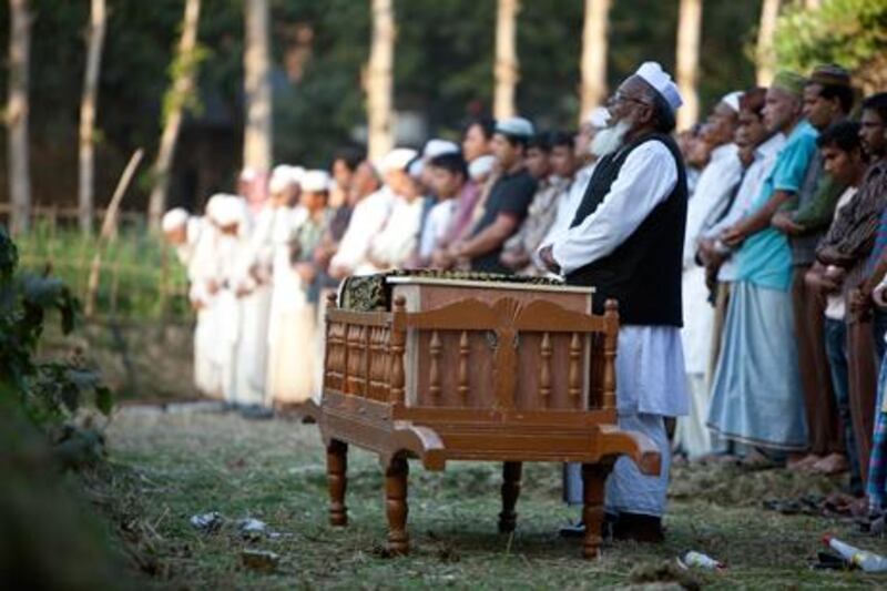 The funeral of Mohammed Ala Uddin, one of the Al Ain bus-crash victims. The UAE has promised his family one year's salary to help with their loss. Silvia Razgova / The National