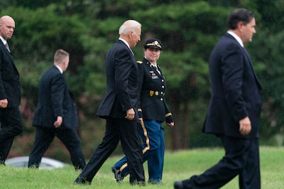 US President Joe Biden walks to board Marine One as he leaves Fort Lesley J McNair in Washington. AP Photo