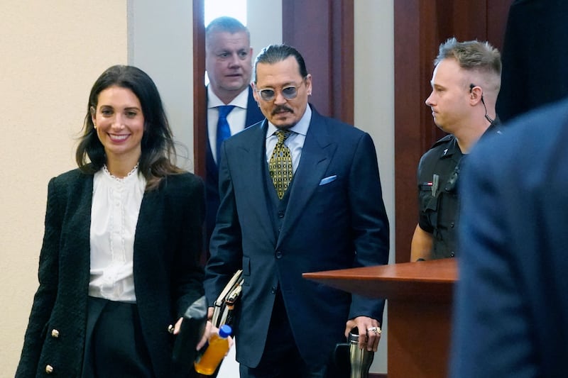 Depp arrives in the courtroom for day 20 of his $50 million defamation suit against his ex-wife. AFP