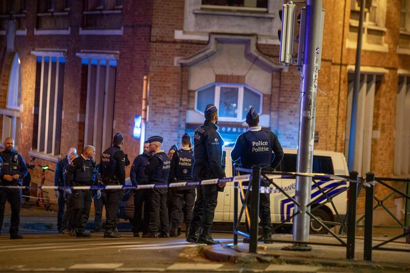 Belgian police at the site of the shootings on the Boulevard d'Ypres, in Brussels, on October 16. AFP