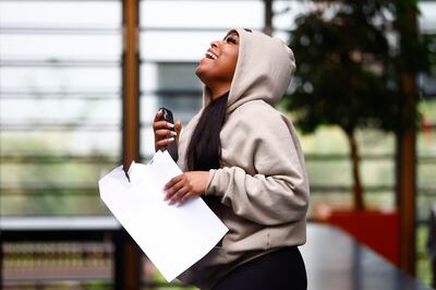 Student Silicate Ibrahim learns her A-level grades. Getty