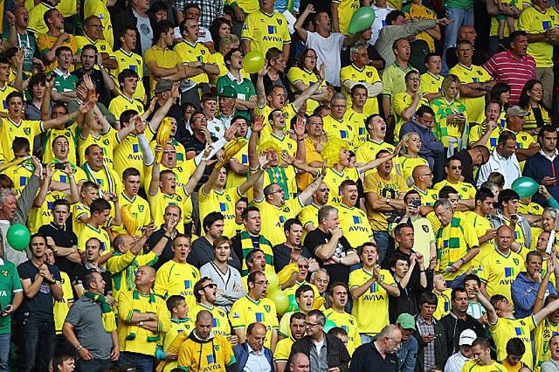 Norwich City fans add a bit of colour to the DW Stadium during their 1-1 draw against Wigan Athletic.

Matthew Lewis / Getty Images