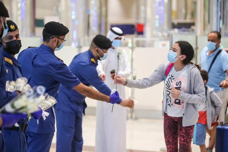 Passengers from Beirut were presented with flowers upon arrival at Dubai International Airport last night. Courtesy: Dubai Customs