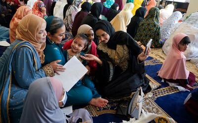 People gather before Eid Al Fitr prayers in Silver Spring, Maryland. AP