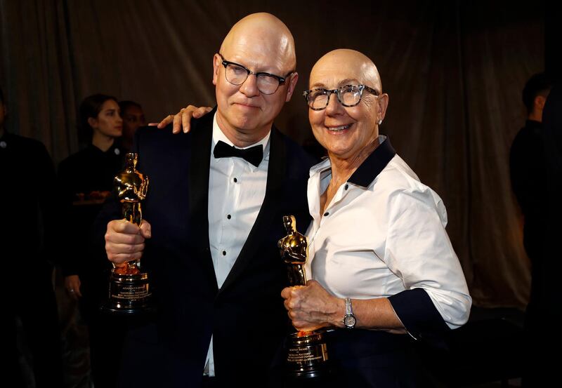 Julia Reichert and Jeff Reichert pose with the Oscar for Best Documentary Feature for "American Factory" at the Governors Ball after the Oscars on Sunday, February 9, 2020, at the Dolby Theatre in Los Angeles. Reuters